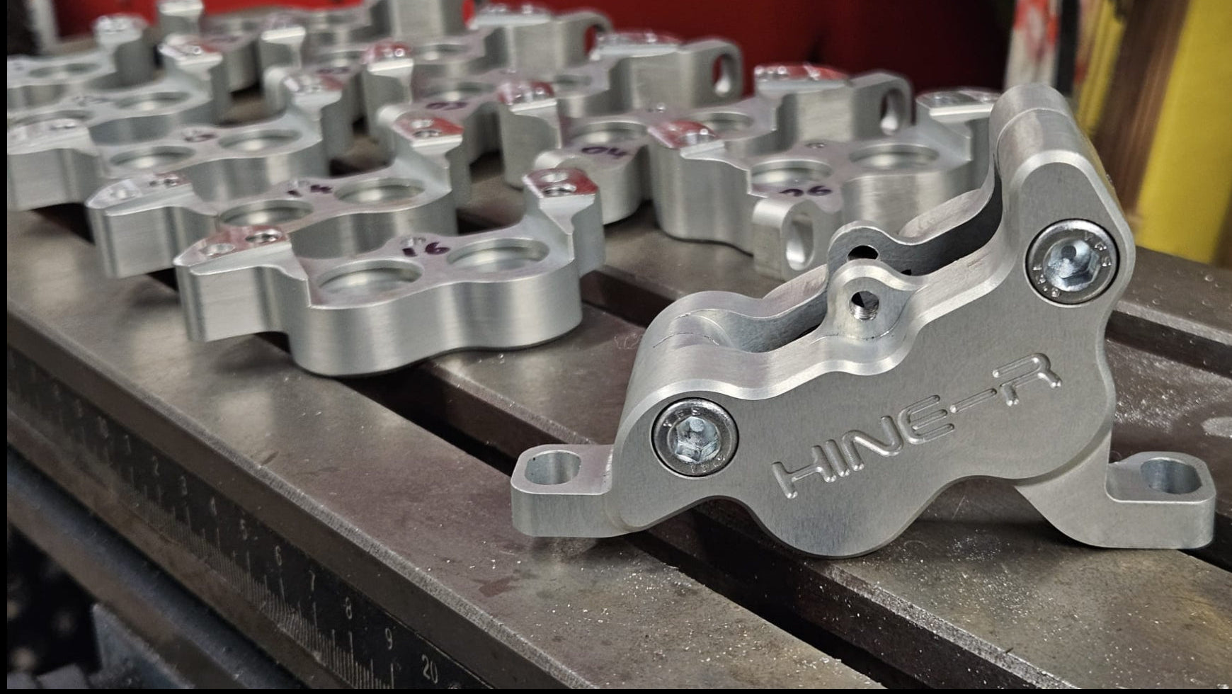 CNC machined aluminium HINE-R bicycle brake caliper prototype on milling machine